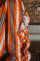 Cooper: Low Blows Shirt. Orange Stripe.