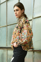 Coop: Button Wouldn't Melt Blouse.