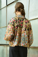 Coop: Button Wouldn't Melt Blouse.
