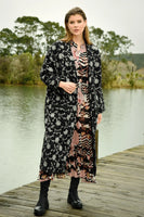 Curate: By The Coat.