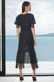 TRELISE COOPER: Turn Up The Volume Dress.